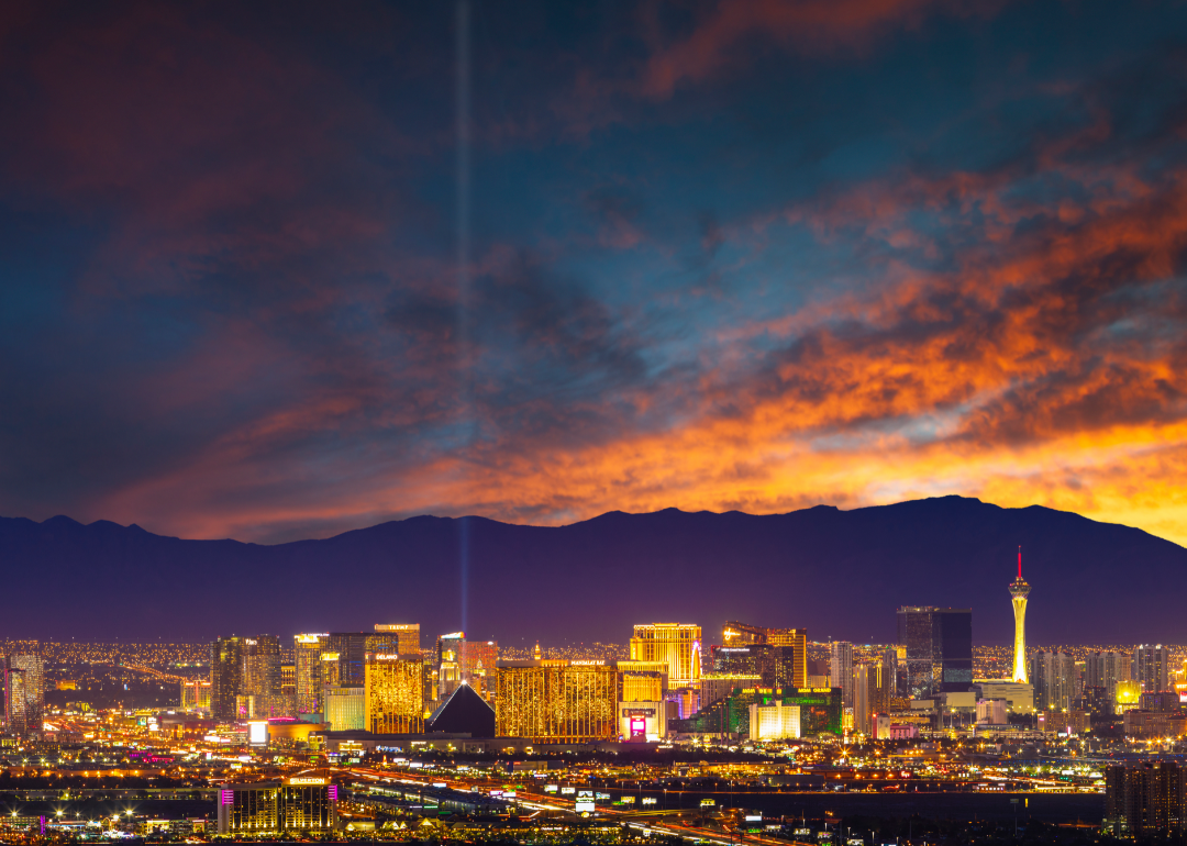 Las Vegas skyline at sunset with mountains in the background