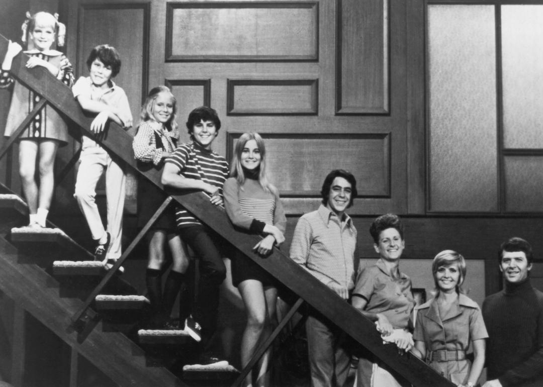 The cast of 'The Brady Bunch' stands on the stairs during the original 1969-74 series.