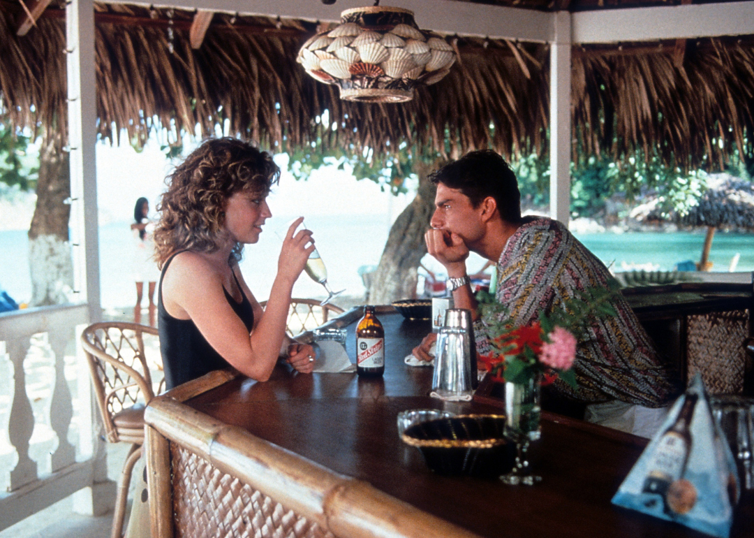 Elisabeth Shue visits Tom Cruise as he bartends in a scene from the film 'Cocktail', 1988. 