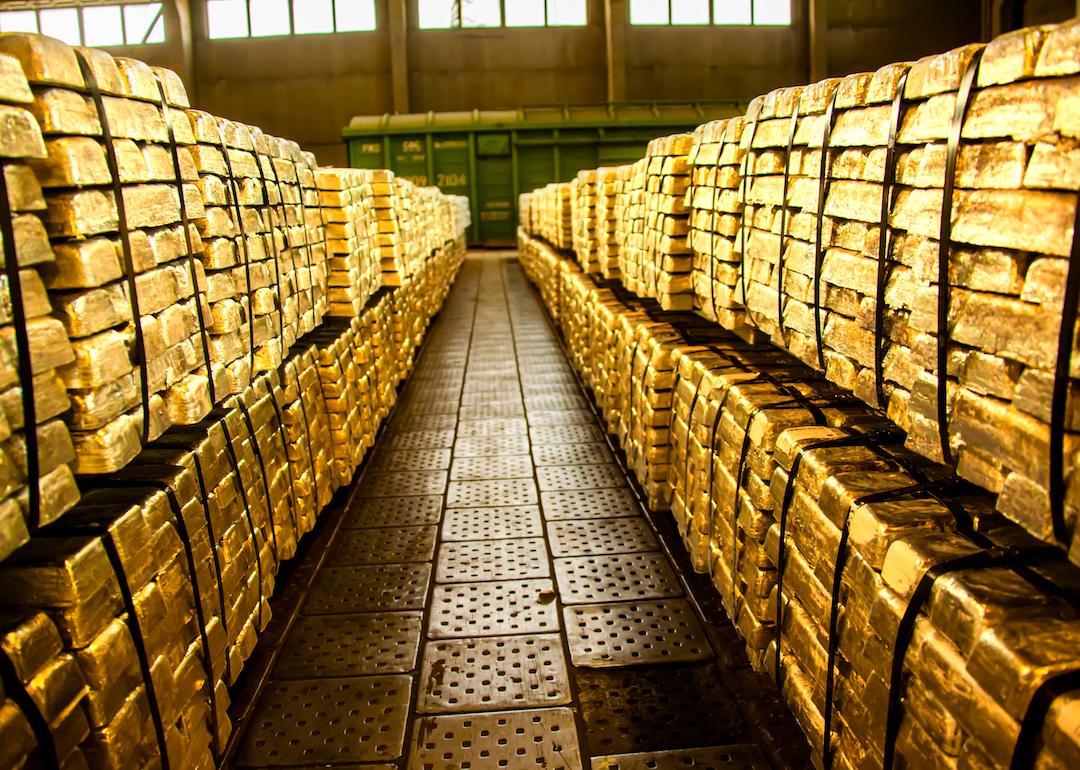 Gold bars piled up in bank.