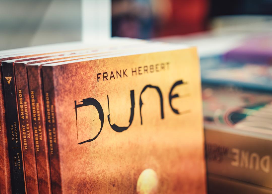 The book Dune by american author Frank Herbert on display in a library.