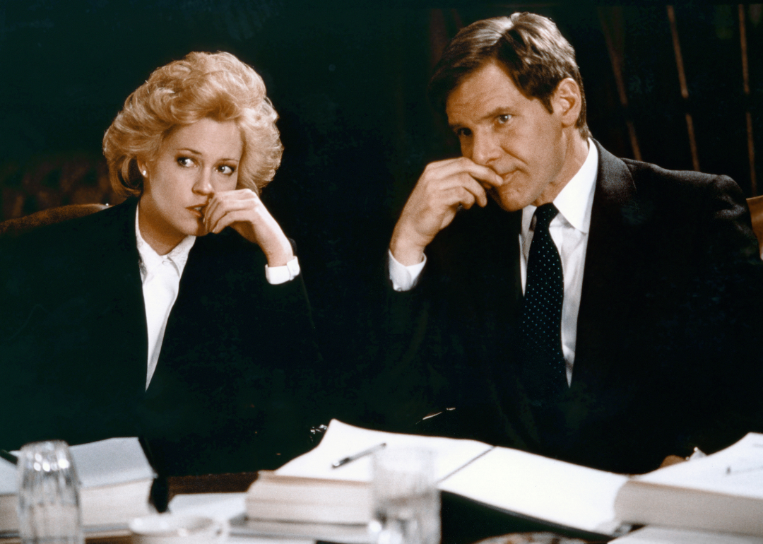 American actors Melanie Griffith and Harrison Ford on the set of "Working Girl" directed by Mike Nichols.