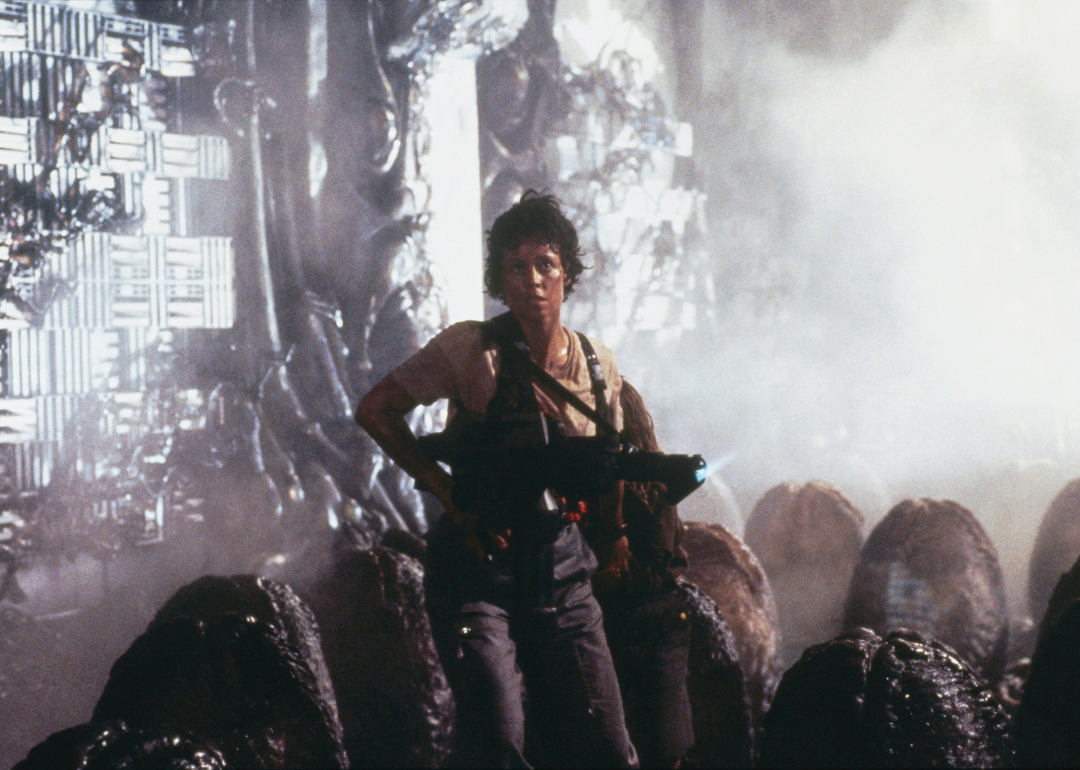 American actor Sigourney Weaver on the set of the film Aliens, directed by James Cameron. 