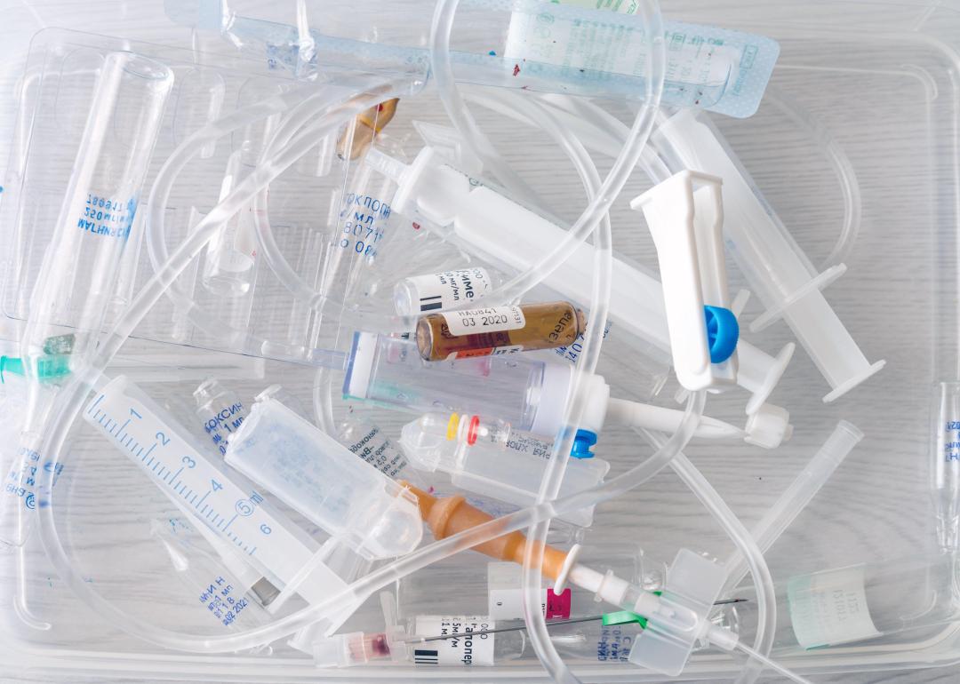 Medical syringes and ampoules of plastic waste.
