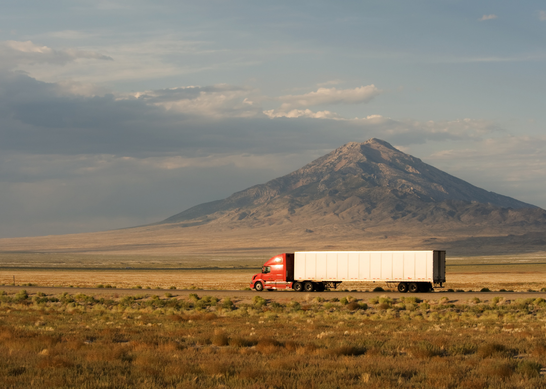 Delivery truck moving on Interstate 80 in Nevada, USA