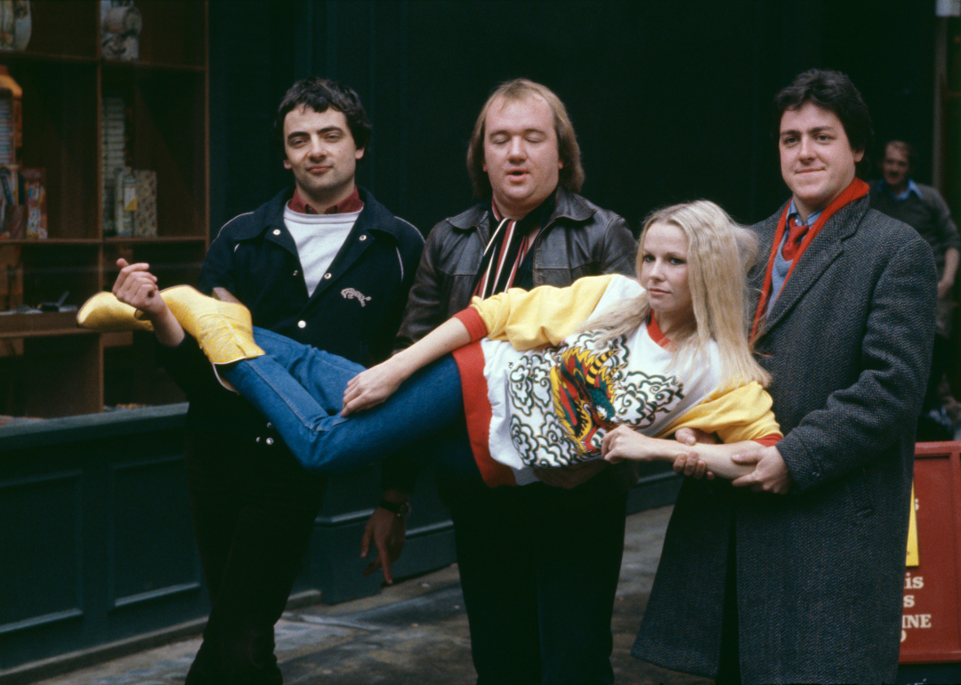 British comedians (left to right) Rowan Atkinson, Mel Smith and Griff Rhys Jones with New Zealand-born comedian Pamela Stephenson in London, 20th October 1980. Together they write and star in the comedy sketch show 'Not the Nine O'Clock News'. 