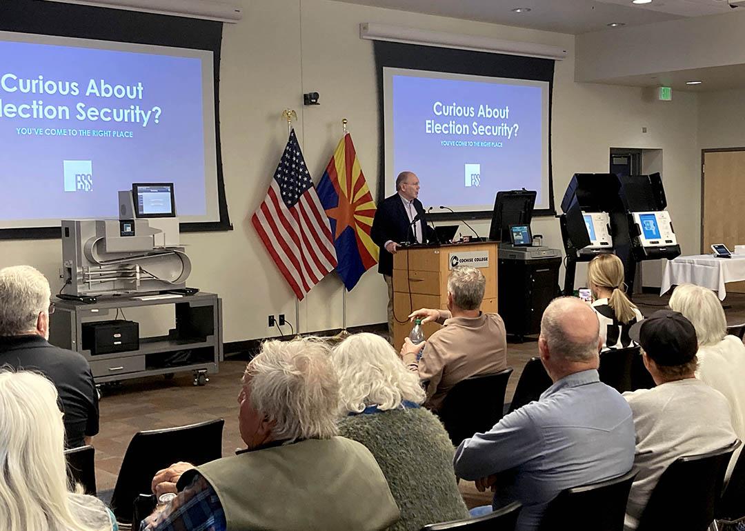 A crowd gathered at Cochise College to take part in a demonstration of voting equipment led by Election Systems and Software in Sierra Vista, Arizona.