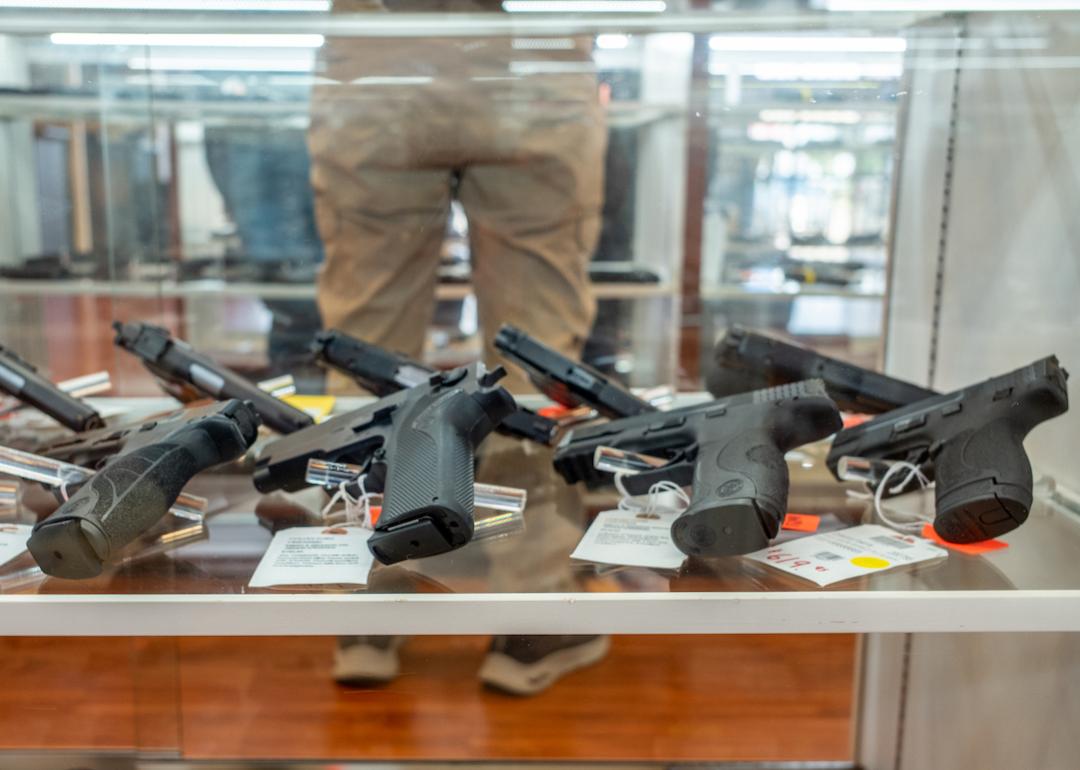 Smith & Wesson handguns are seen for sale in a gun store in Houston, Texas in 2022.