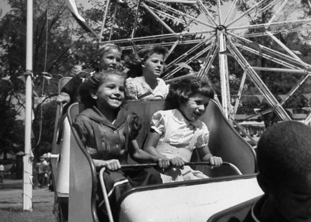 Kids enjoying a ride at the California state fair, 1953.