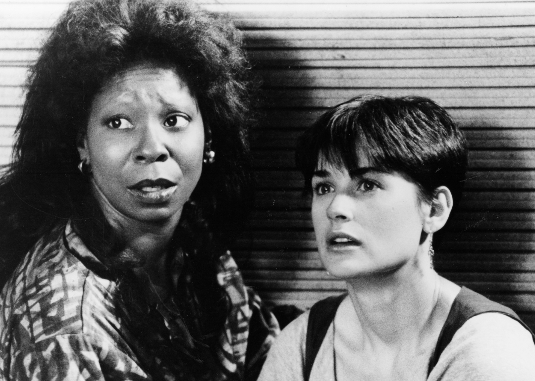  The ghost of Sam Wheat is able to communicate with Molly Jensen (Demi Moore, right) through psychic Oda Mae Brown (Whoopi Goldberg) in the suspense thriller "Ghost", directed by Jerry Zucker. 