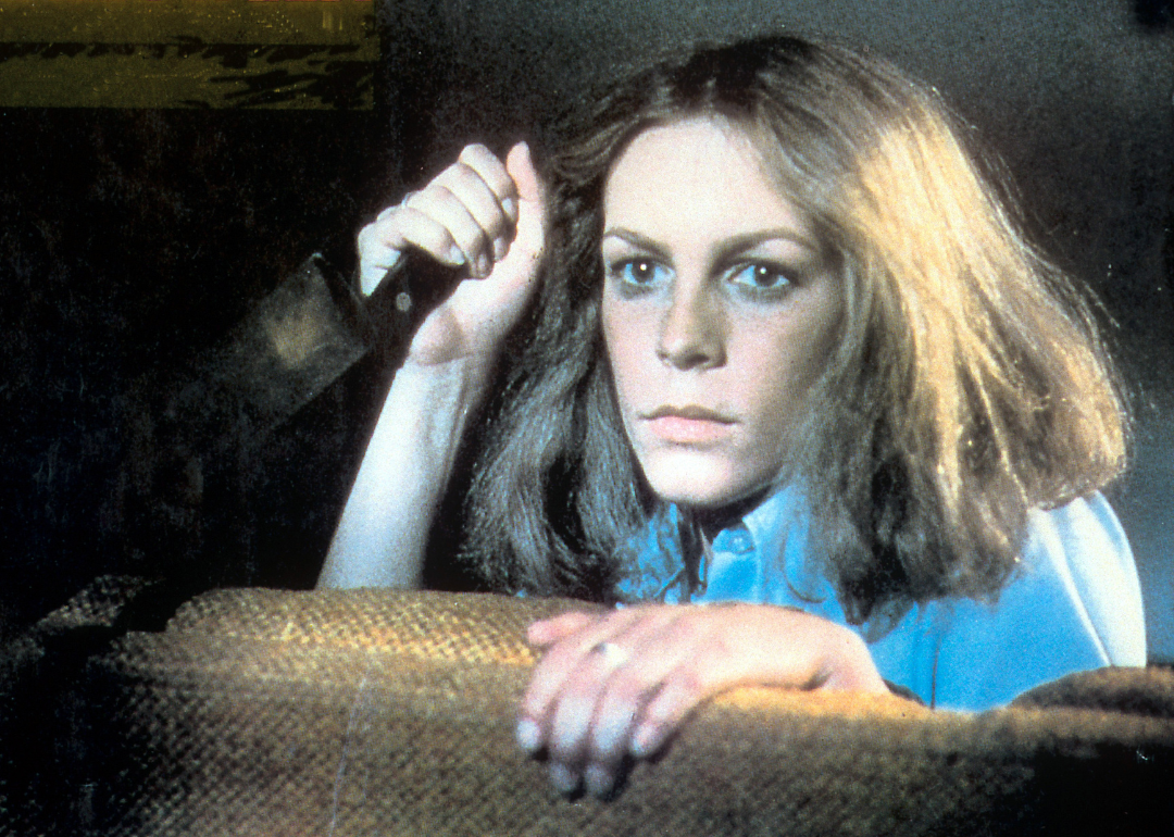Jamie Lee Curtis holds a knife in a scene from the film 'Halloween', 1978. 