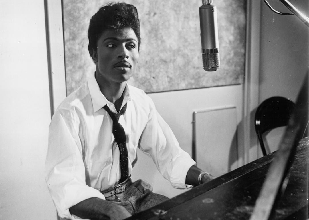 Musician Little Richard in the recording studio at a microphone and piano in circa 1959.