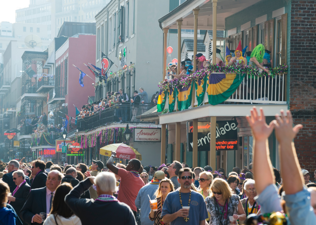 People on the streets of New Orleans, Louisiana during Mardi Gras.