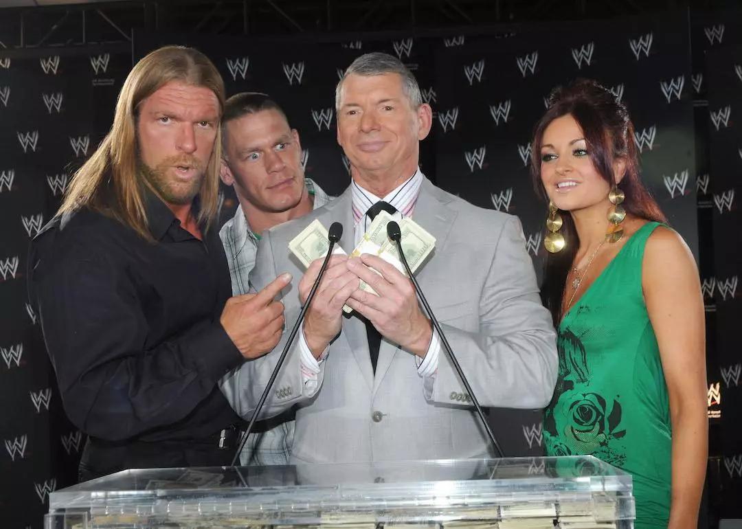Wrestlers Triple H and John Cena, WWE Chairman Vince McMahon, and WWE Diva Maria at the 1 Million Dollar Mania press conference in 2008 in Los Angeles, California.
