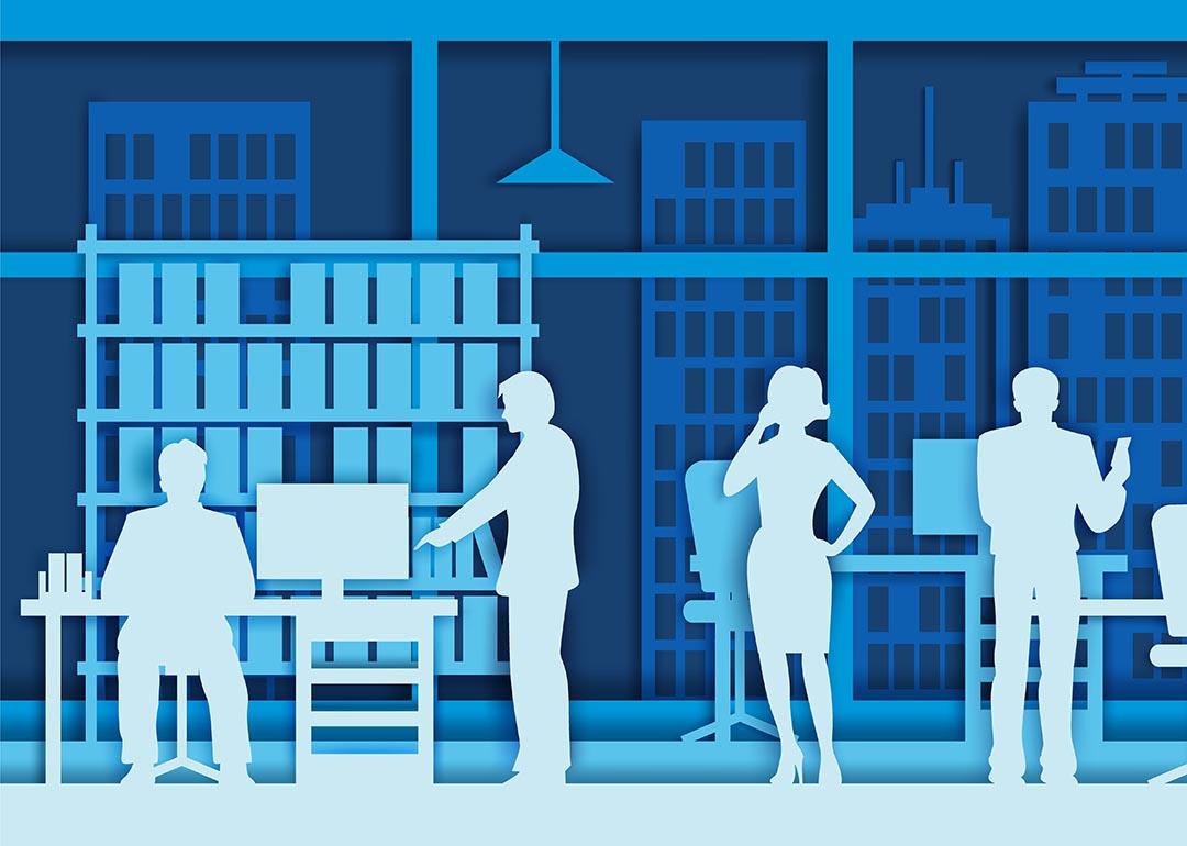 Concept of working office illustrated by silhouettes of employees made with white cut paper on blue background.