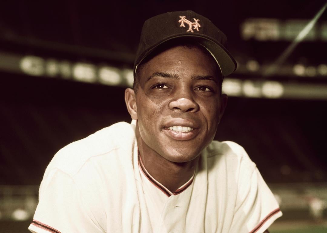 Willie Mays of the New York Giants is shown here in this three-quarters length photo on one knee. 