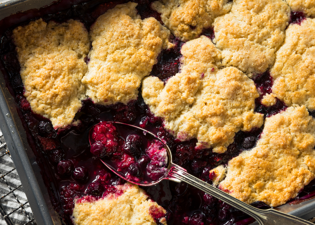 Homemade blueberry cobbler fresh out of the oven in a baking pan