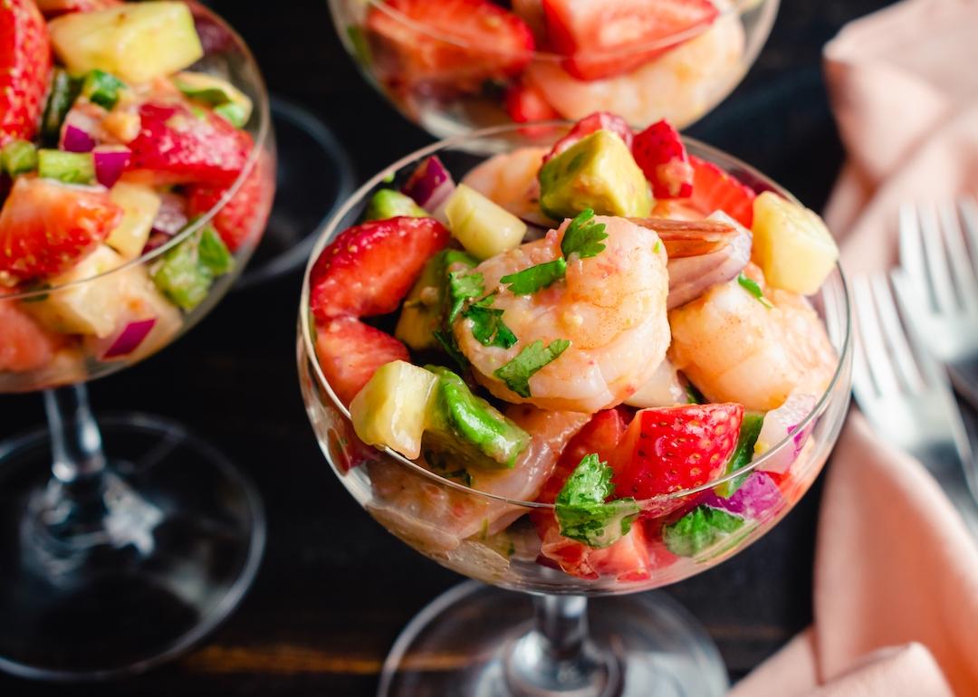 Strawberry shrimp ceviche served in coupe glasses.