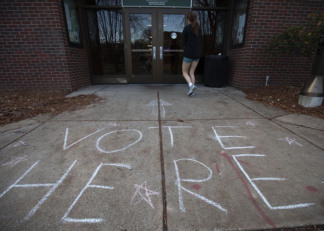 A person enters a polling location on the Michigan State University campus on Election Day.