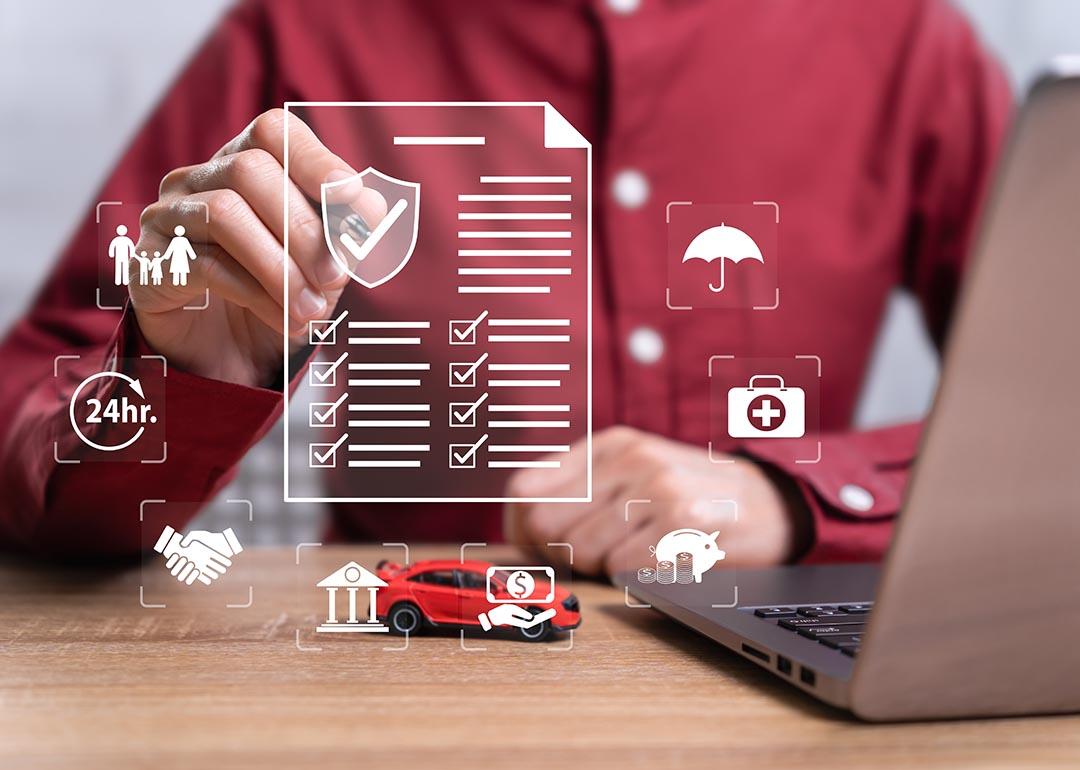 Graphic design checklist and icons representing risks overlaid on image of person sitting at a desk; concept of insurance.