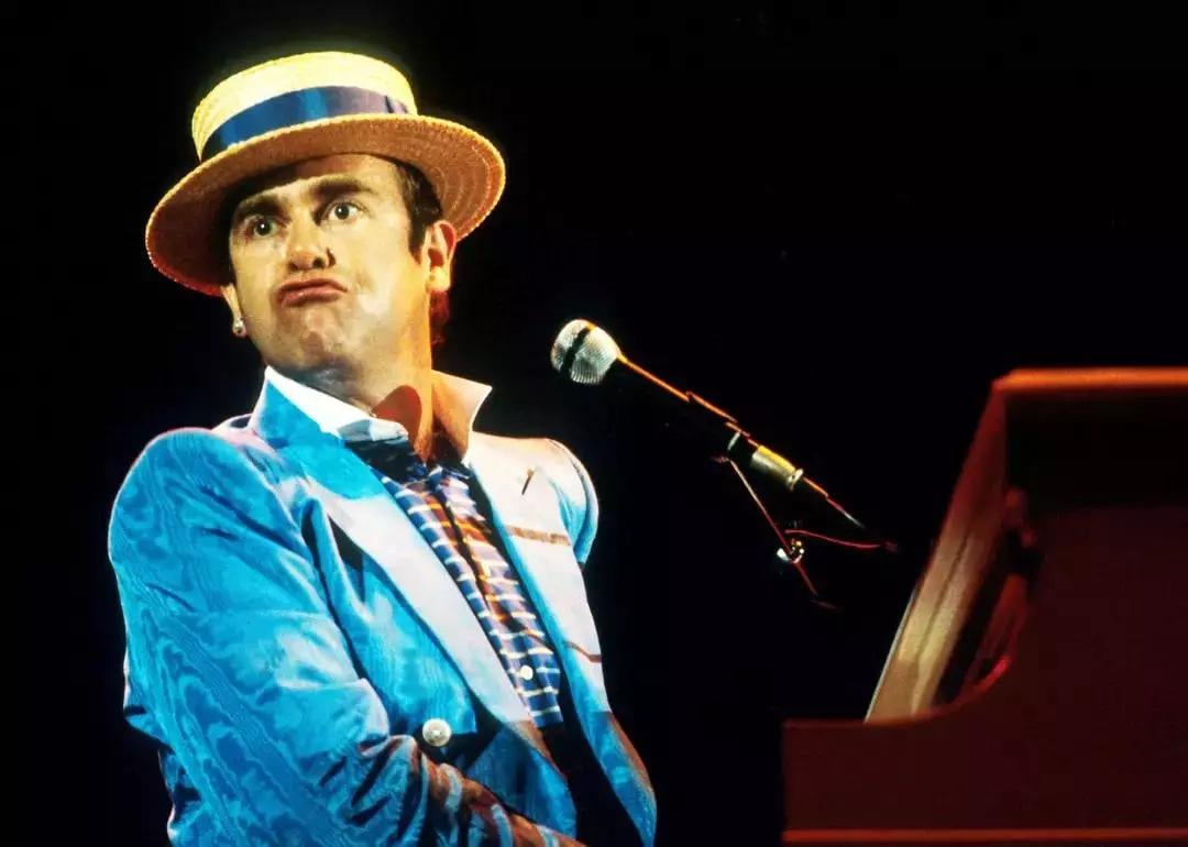 British musician Elton John performs in concert in 1984.