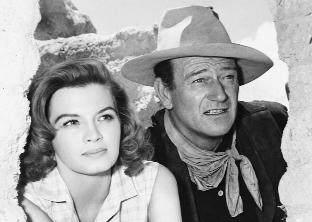 Actors Angie Dickinson and John Wayne star in the western 'Rio Bravo', 1959.