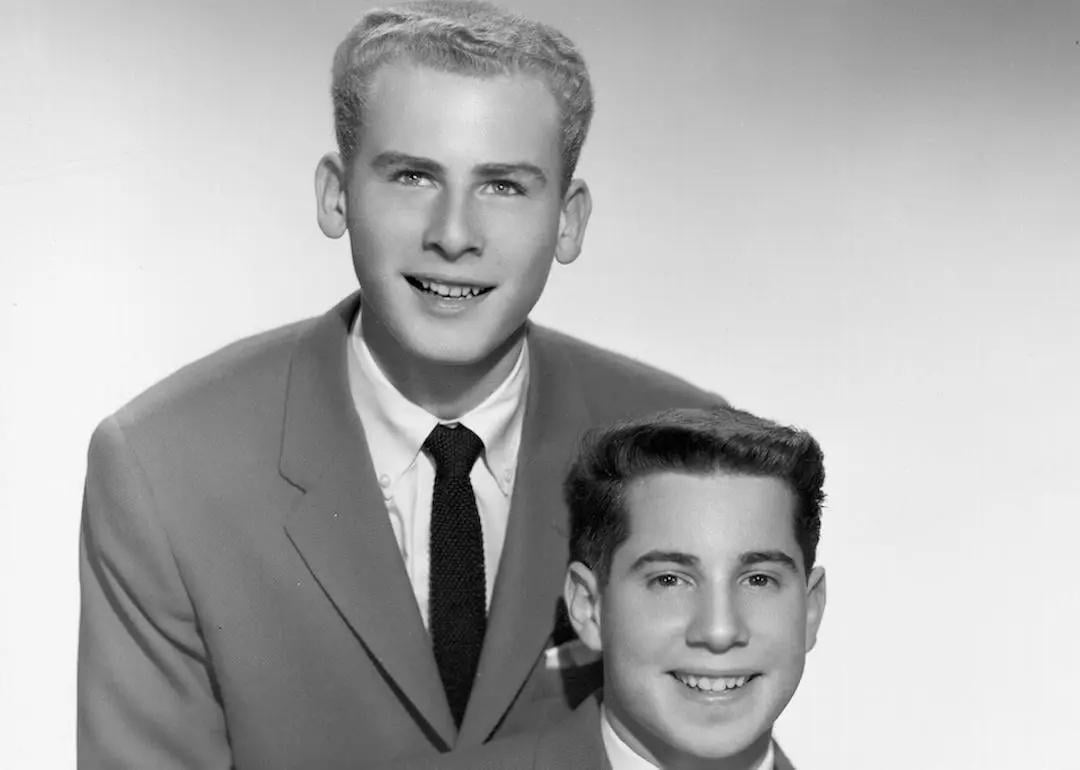  Art Garfunkel and Paul Simon as Tom and Jerry pose for a portrait circa 1957