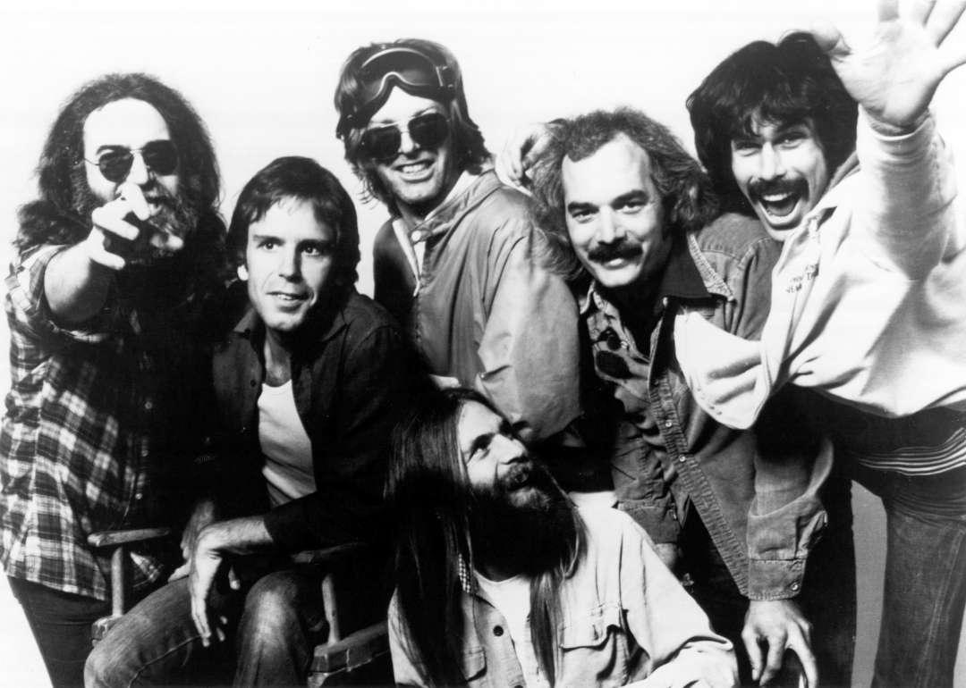 Members of the band Grateful Dead in a studio portrait, circa 1970