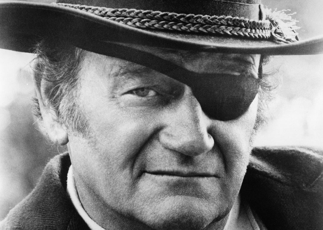 John Wayne as Rooster Cogburn in a scene from the 1969 movie 'True Grit.'