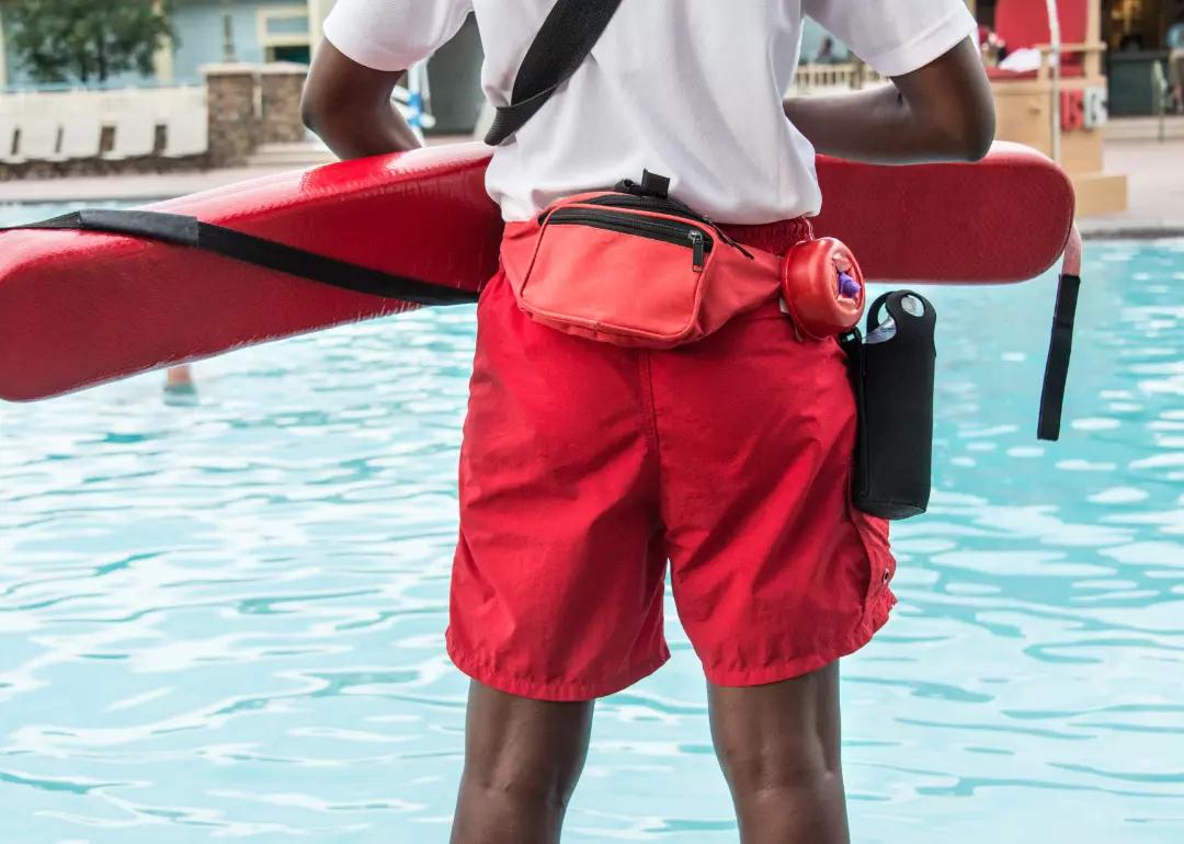 Lifeguard looking over pool.