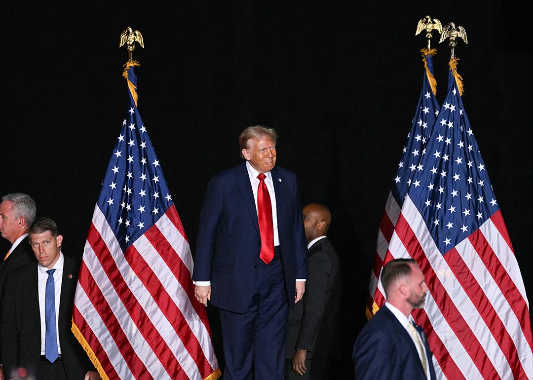 Secret service agents stand guard around presidential candidate Donald Trump.