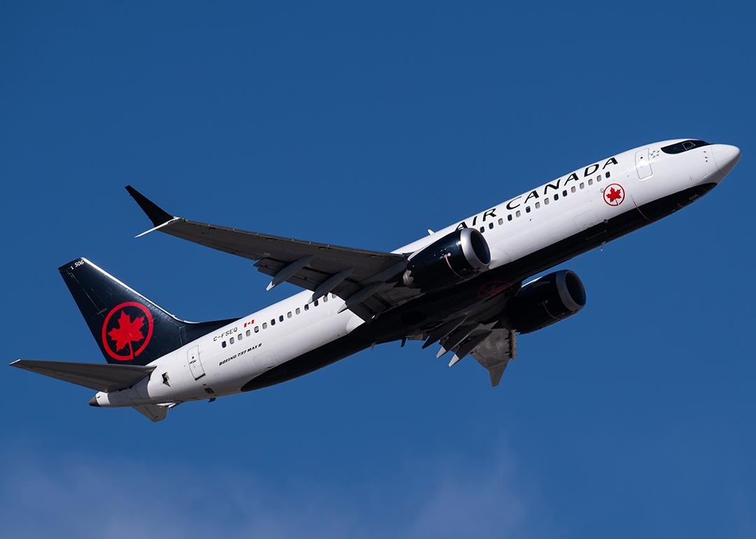 An Air Canada plane in the sky.