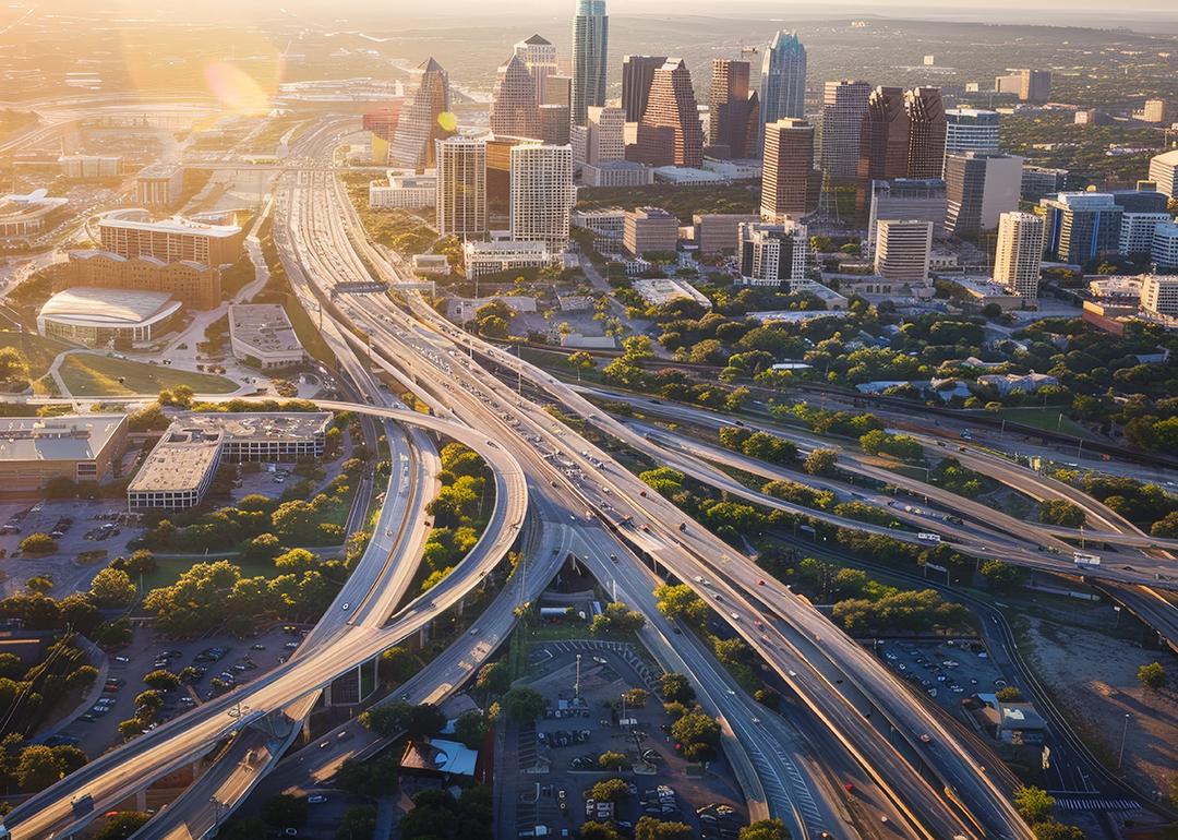 Aerial view of Austin, Texas and its freeway system during sunset.