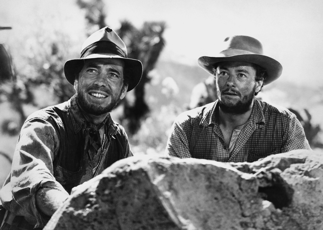  Actors Humphrey Bogart and Tim Holt pose for a publicity still for the Warner Bros/First National film 'The Treasure of the Sierra Madre' in 1948. 