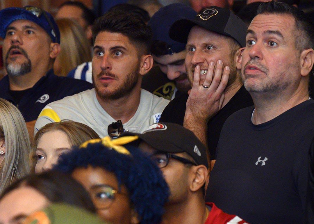 Photo of football fans watching NFC championships in a sports bar. 