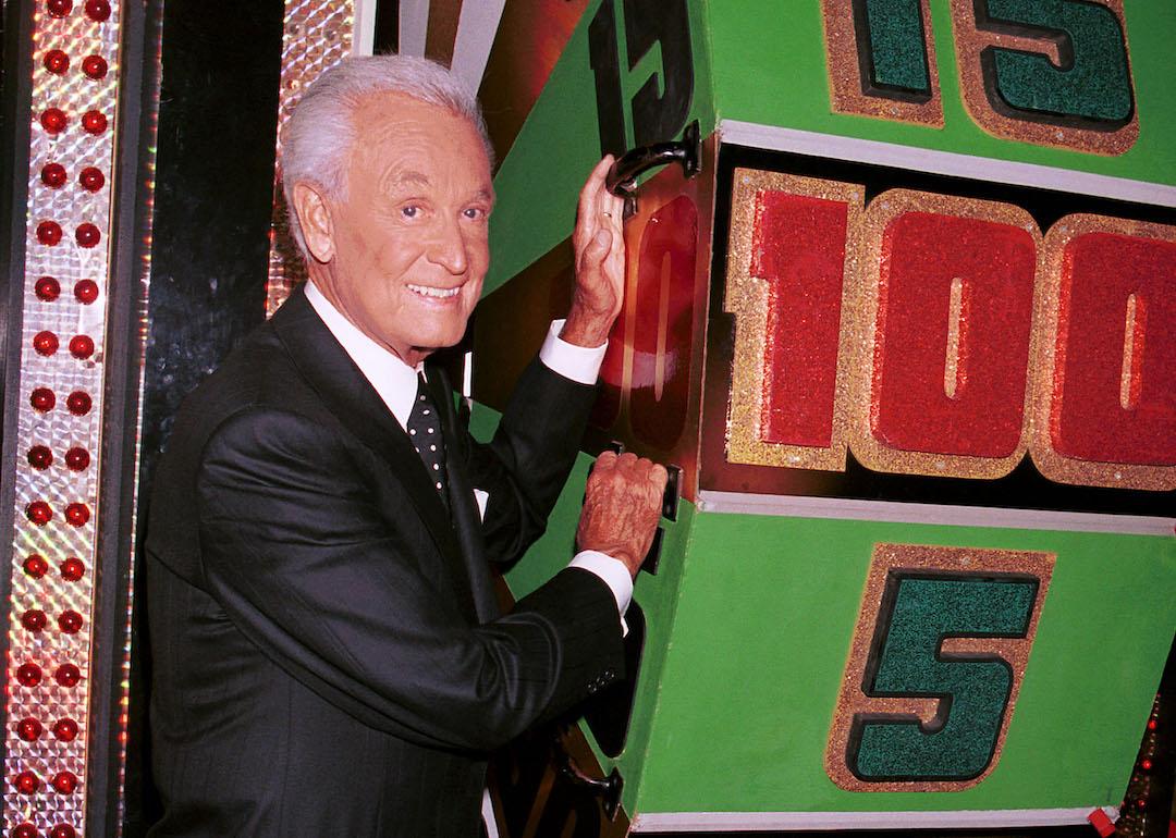 Game show host Bob Barker poses by one of the game props at CBS Studios to celebrate his 30th anniversary as host of 'The Price Is Right.'