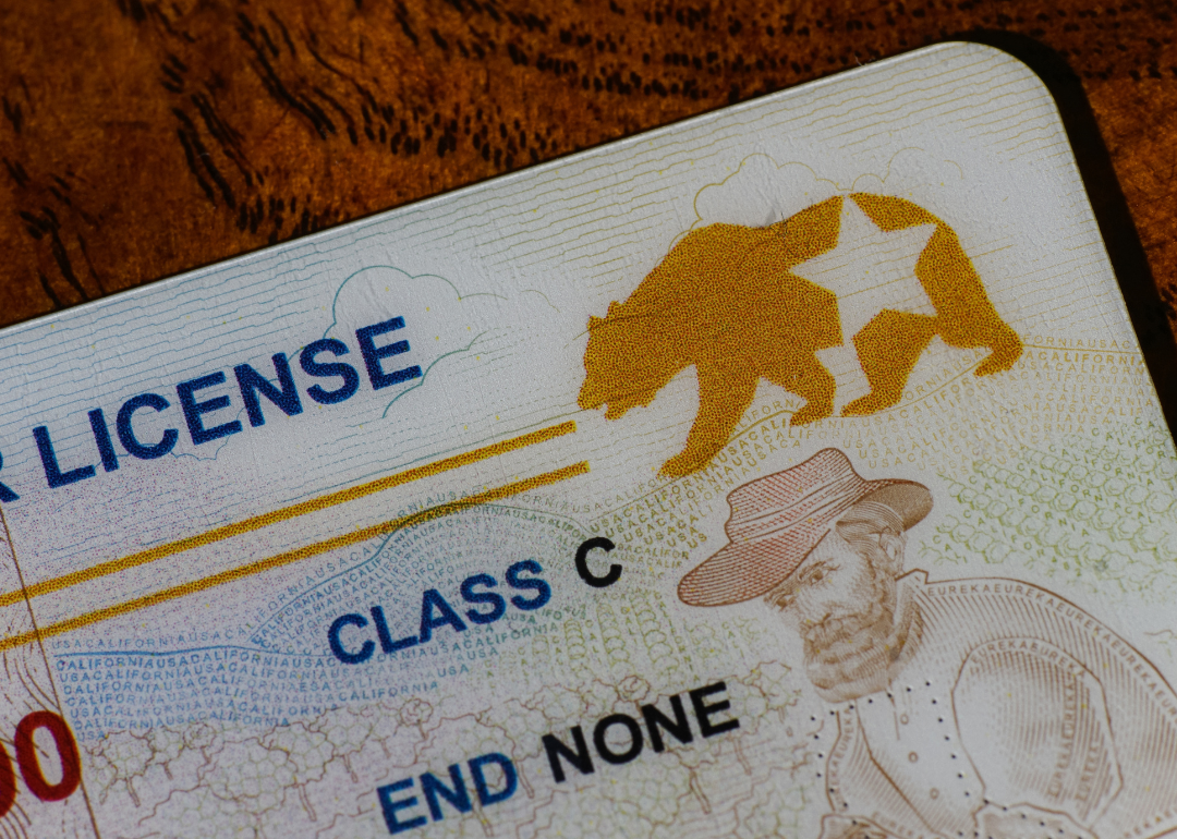 A closeup of the corner of a California Real ID driver license focusing on the REAL ID logo.