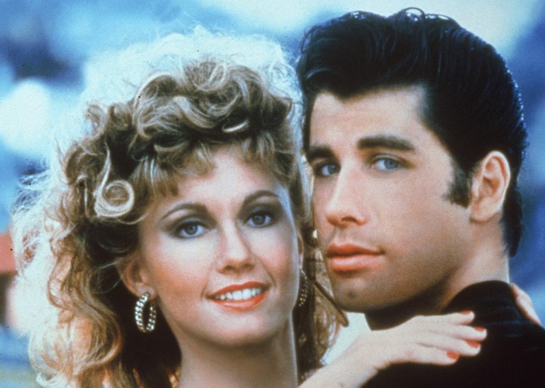 Actors Olivia Newton-John and John Travolta embrace in a promotional still for the 1978 film, 'Grease.'