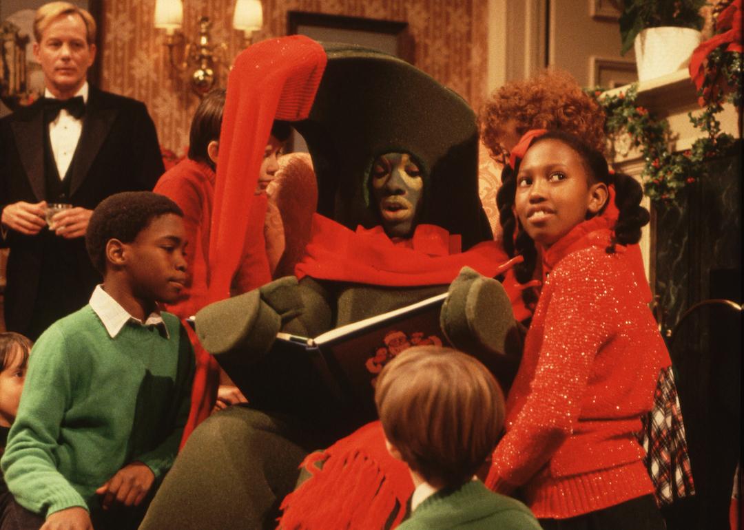 Children gather around Eddie Murphy performing as Gumby in a Christmas skit on 'Saturday Night Live.'