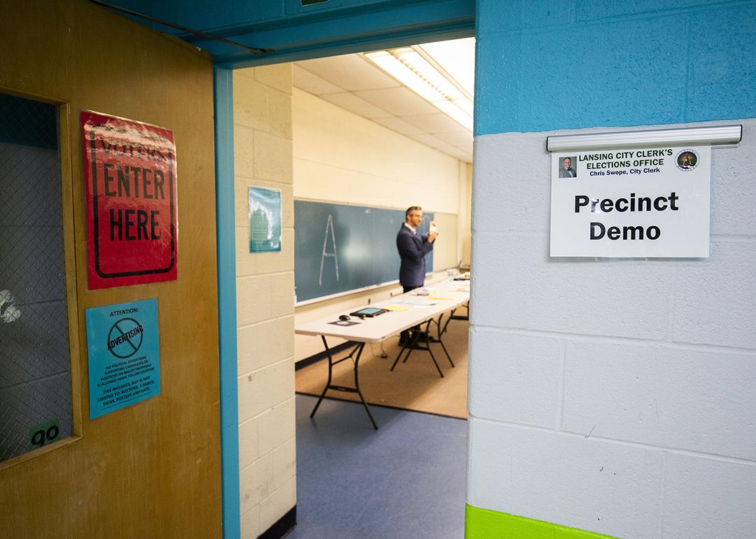 Election workers receive training, prepare ballots for mailing, and do testing at the Reo Elections Office on October 3, 2024 in Lansing, MI.