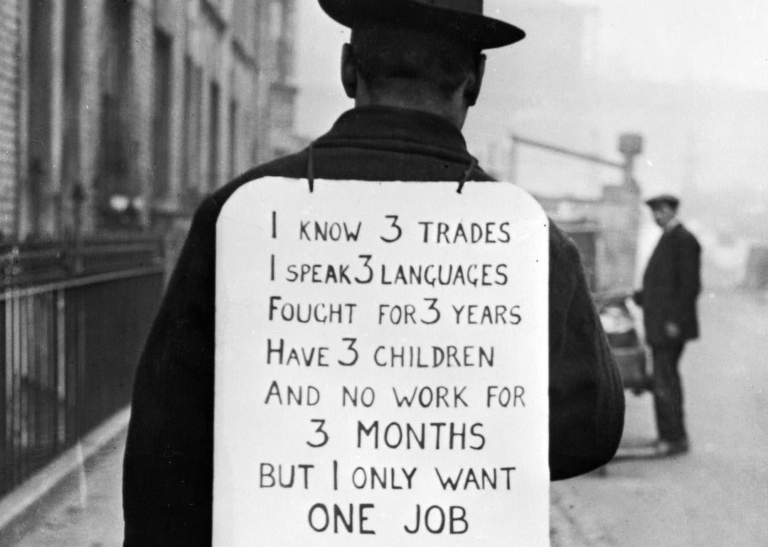 A person making their own protest against unemployment during the Great Depression.