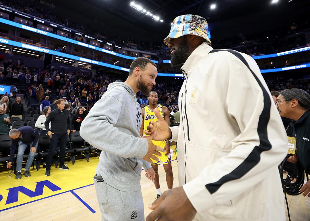 Stephen Curry greets LeBron James after their preseason game on October 18, 2024 at the Chase Center in San Francisco, CA.