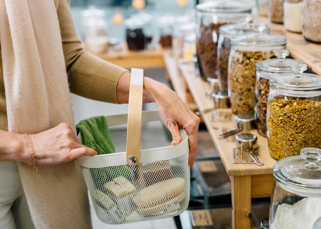 A woman shops at a zero-waste store.