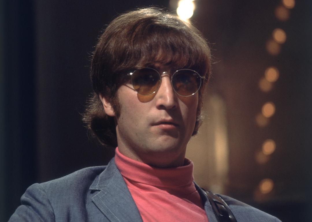 John Lennon of The Beatles wearing sunglasses in 1966.