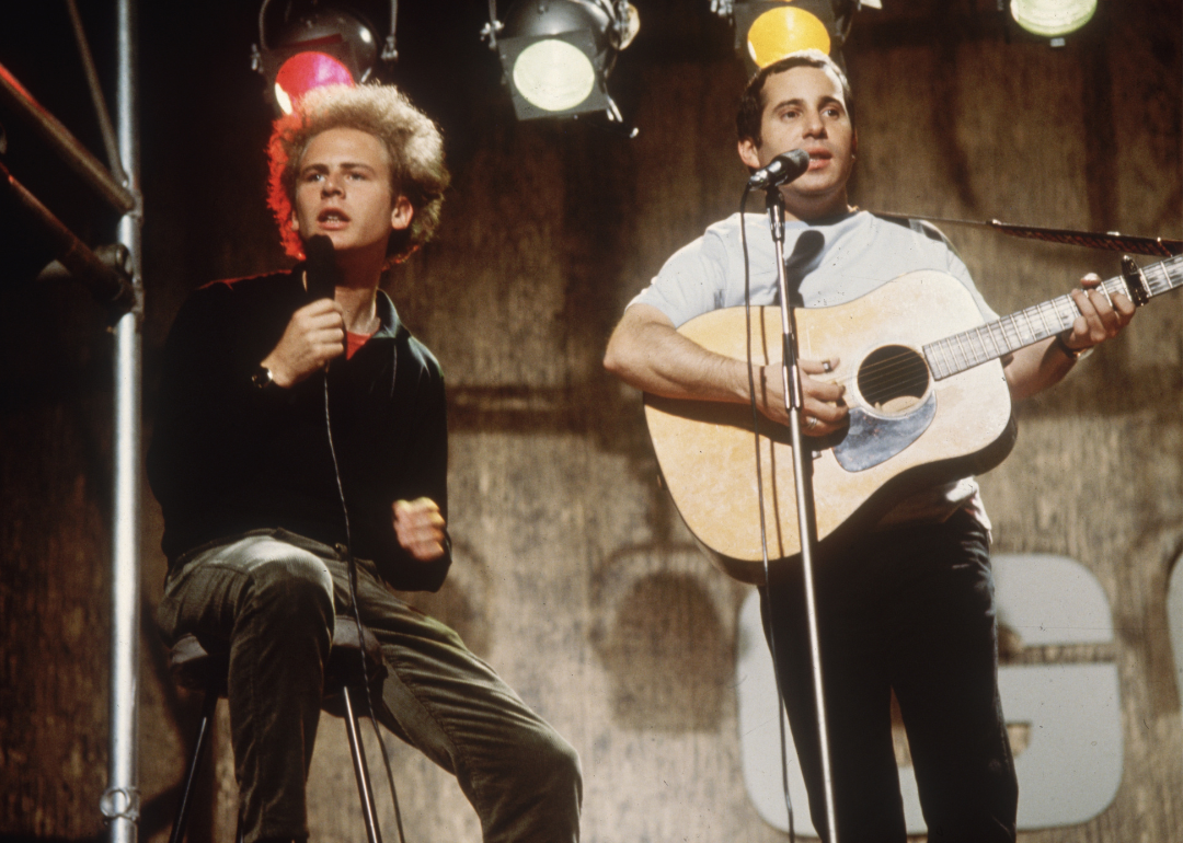 Pop duo Simon and Garfunkel, comprising (L-R) singer, Art Garfunkel and singer-songwriter, Paul Simon, performing on ITV's 'Ready, Steady, Go!', July 8, 1966.