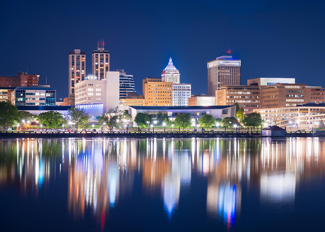 A view of Peoria, Illinois' downtown skyline and lake at dusk.