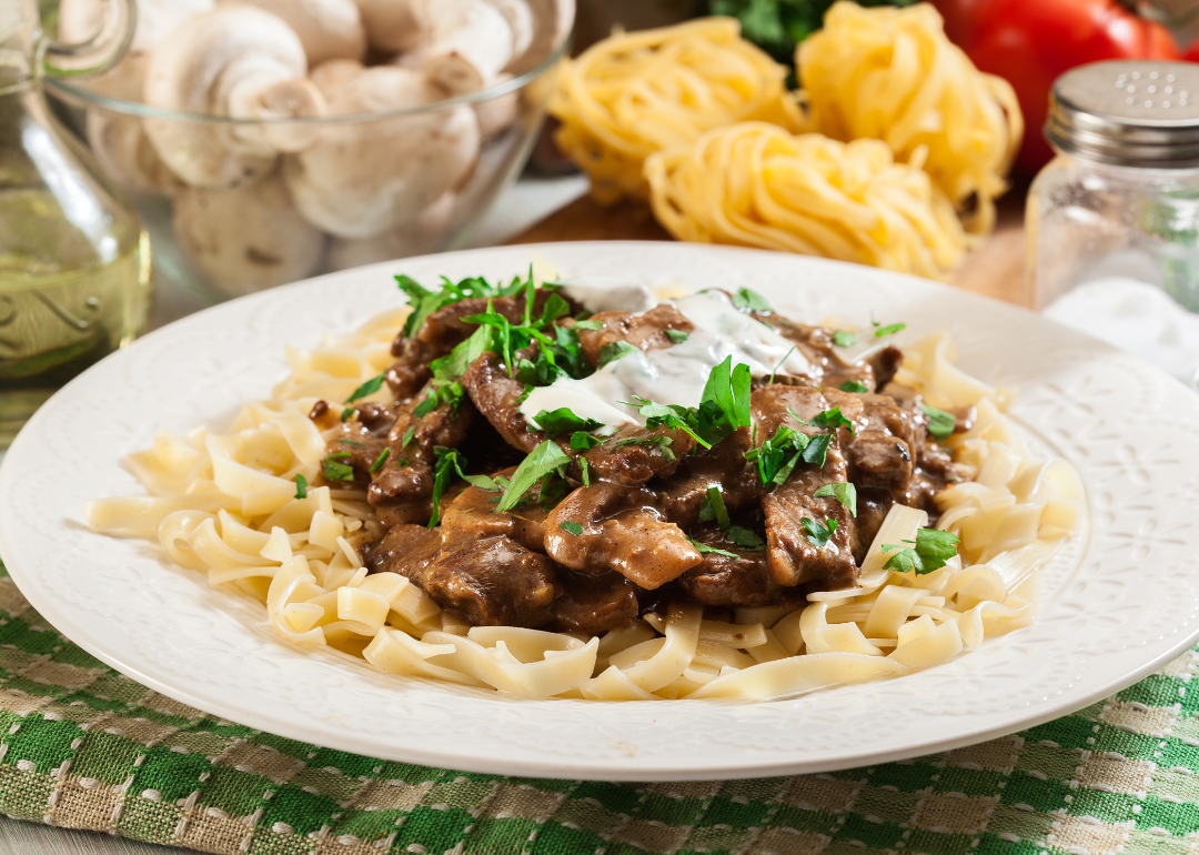 Homemade beef stroganoff with mushrooms and tagliatelle pasta