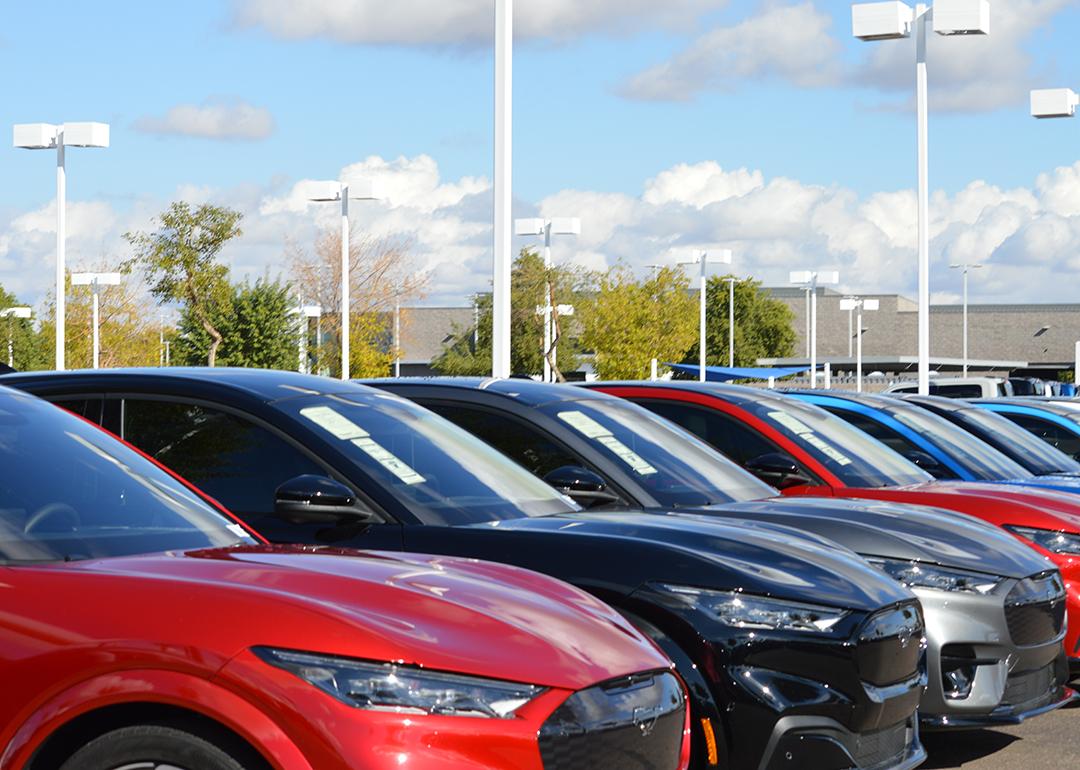 Used SUVs up for sale in a parking lot.