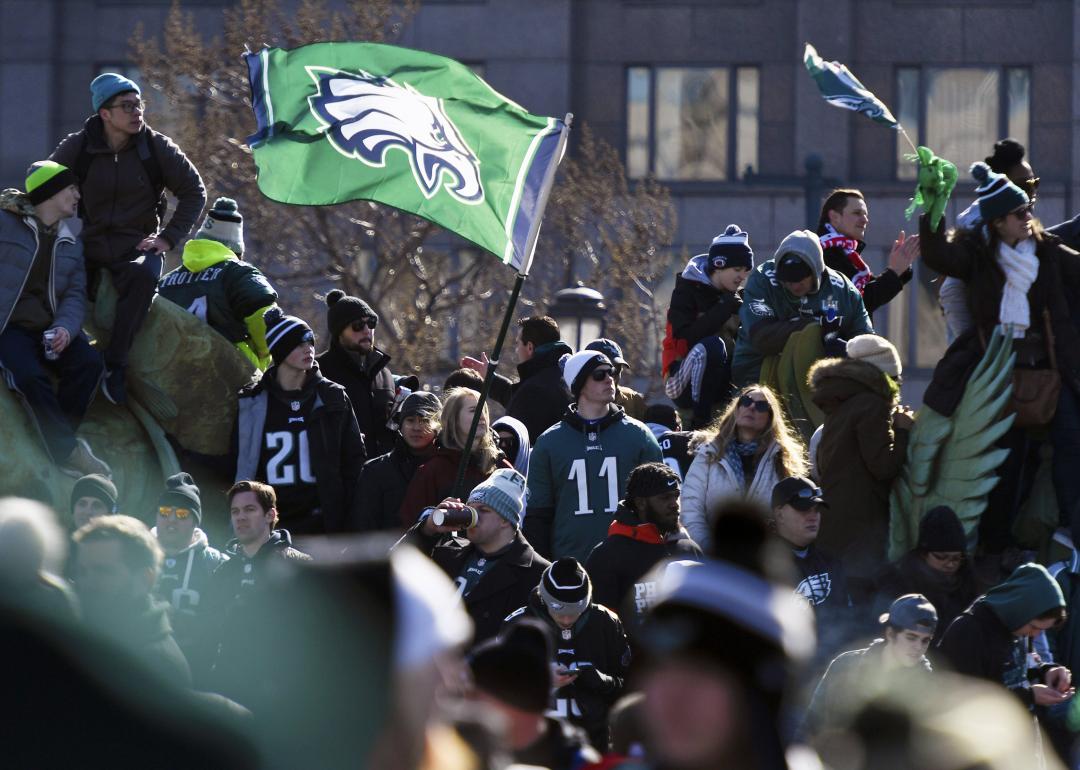 Eagles fans celebrate during a Super Bowl championship parade in Philadelphia.