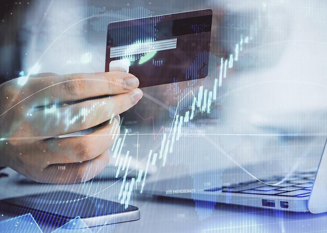 Business credit card usage illustrated with financial graphs.